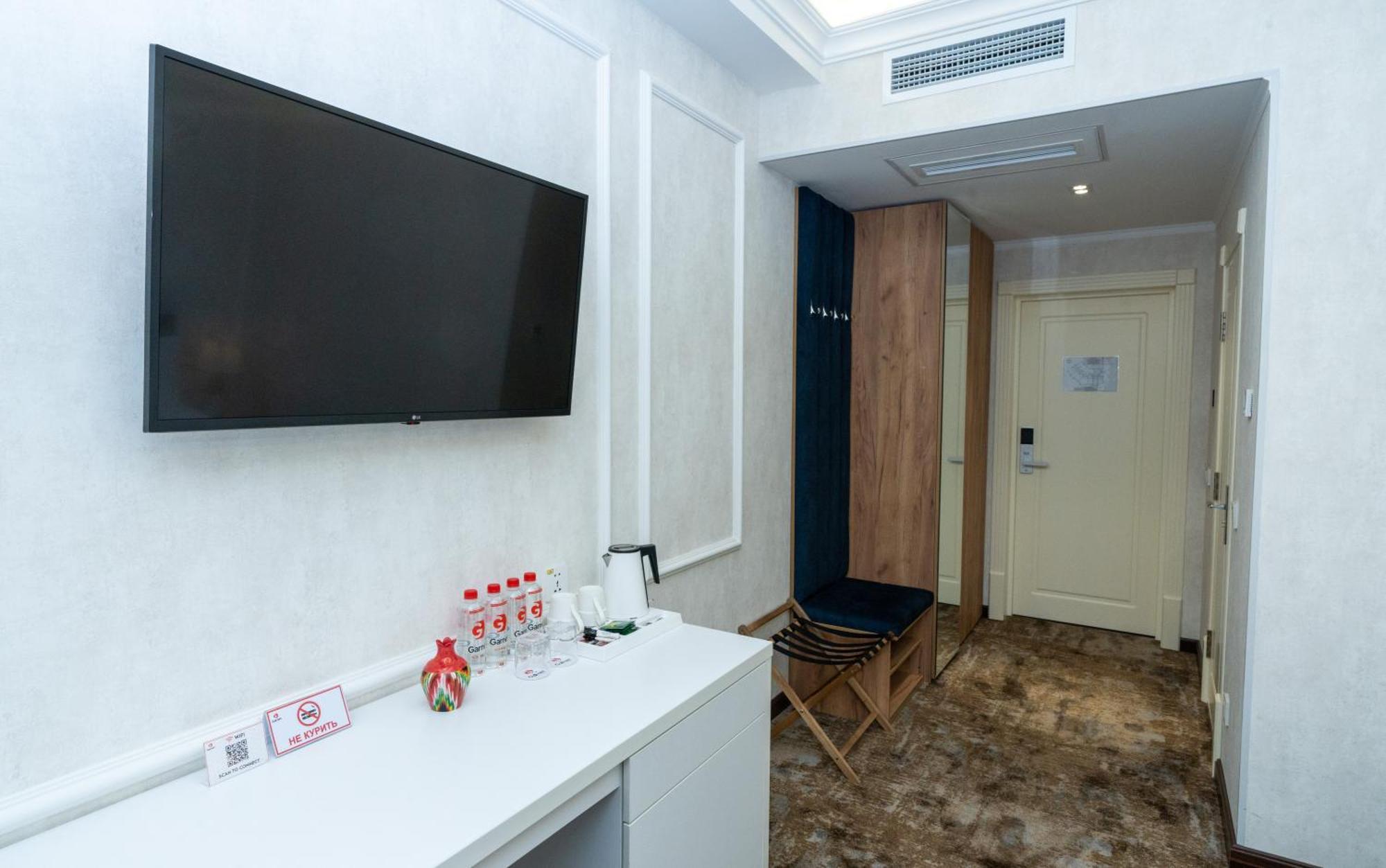 Garnet Mir Hotel Tashkent Quarto foto